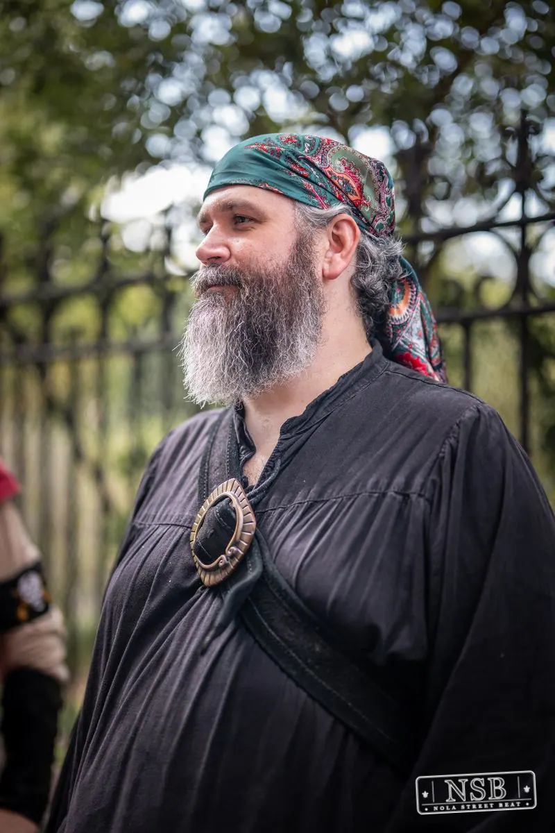 Portrait of a bandana-wearing attendee at Dirty Linen Night 2026 on Royal Street