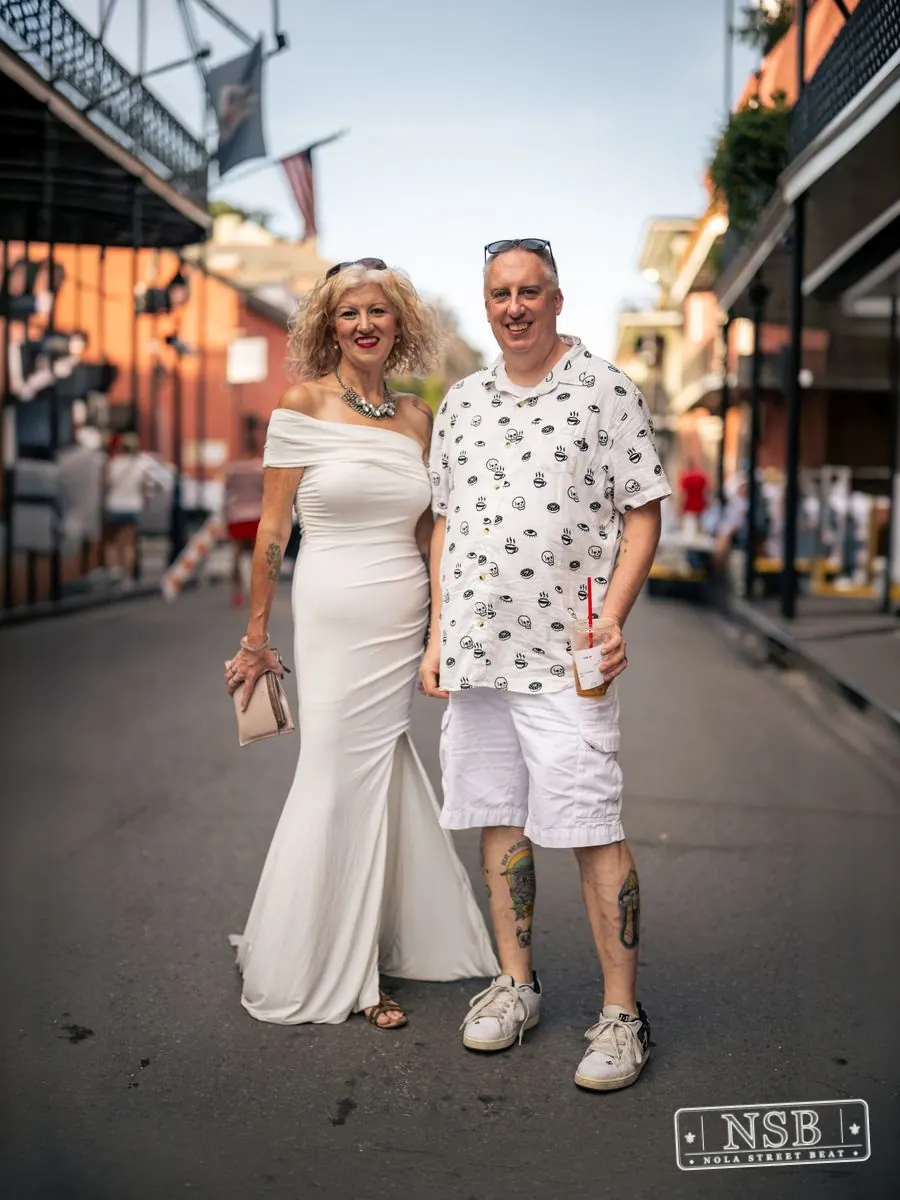 Three attendees dressed in linen at Dirty Linen Night 2026 in the French Quarter