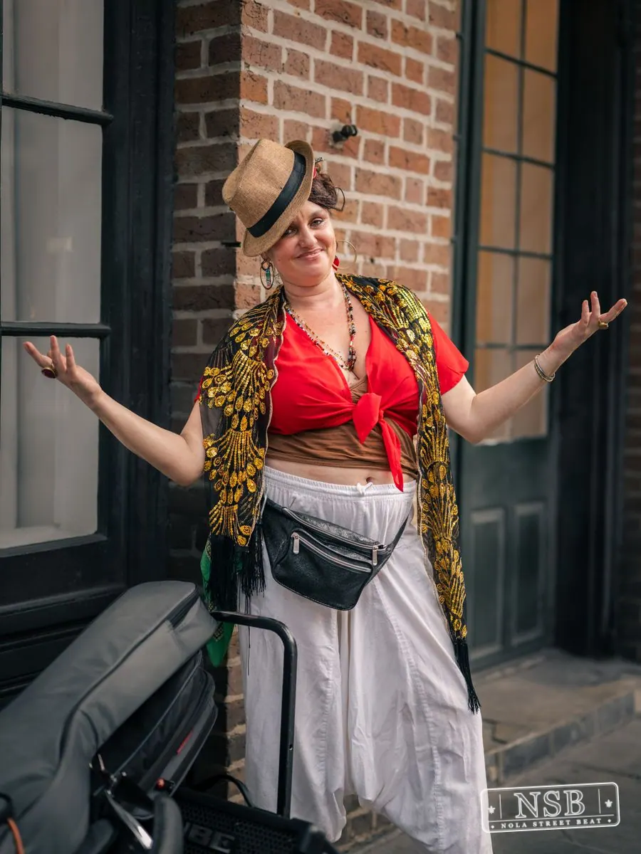 Expressive costumed attendee on Royal Street during Dirty Linen Night 2026