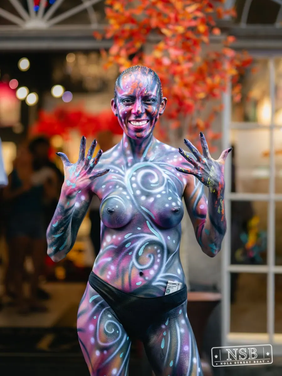 Body-painted performer posing at Dirty Linen Night 2026 in New Orleans