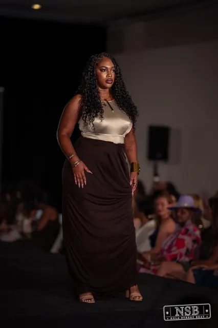 Beige top and brown maxi skirt on the runway at New Orleans Fashion Week 2026. Photo 0035 by Nola Street Beat.